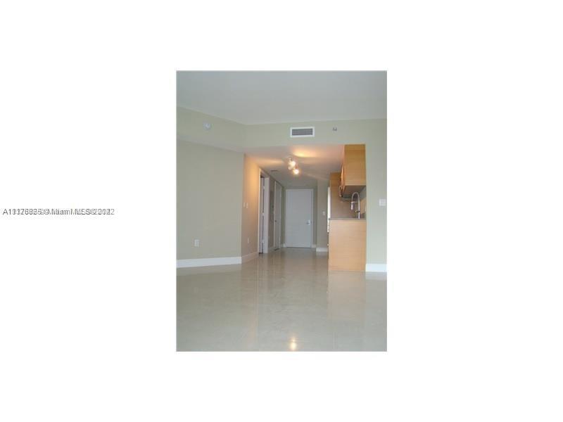 475 Brickell Avenue, Unit 808 Miami, FL 33131 - Photo 2 of 12 a picture of a room with a white wall