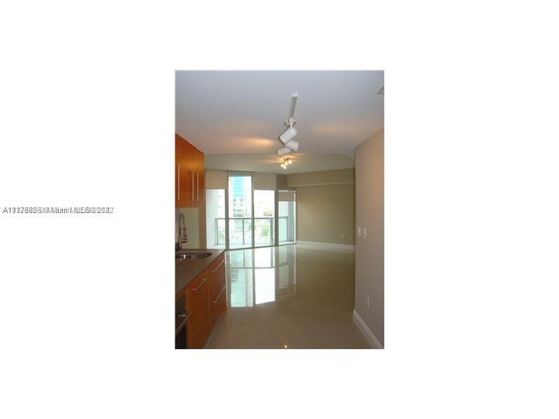 475 Brickell Avenue, Unit 808 Miami, FL 33131 - Photo 4 of 12 a picture of a room that has a window in it