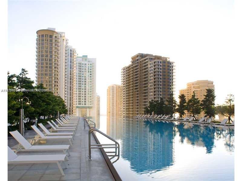 475 Brickell Avenue, Unit 808 Miami, FL 33131 - Photo 10 of 12 a view of lake and city with tall buildings