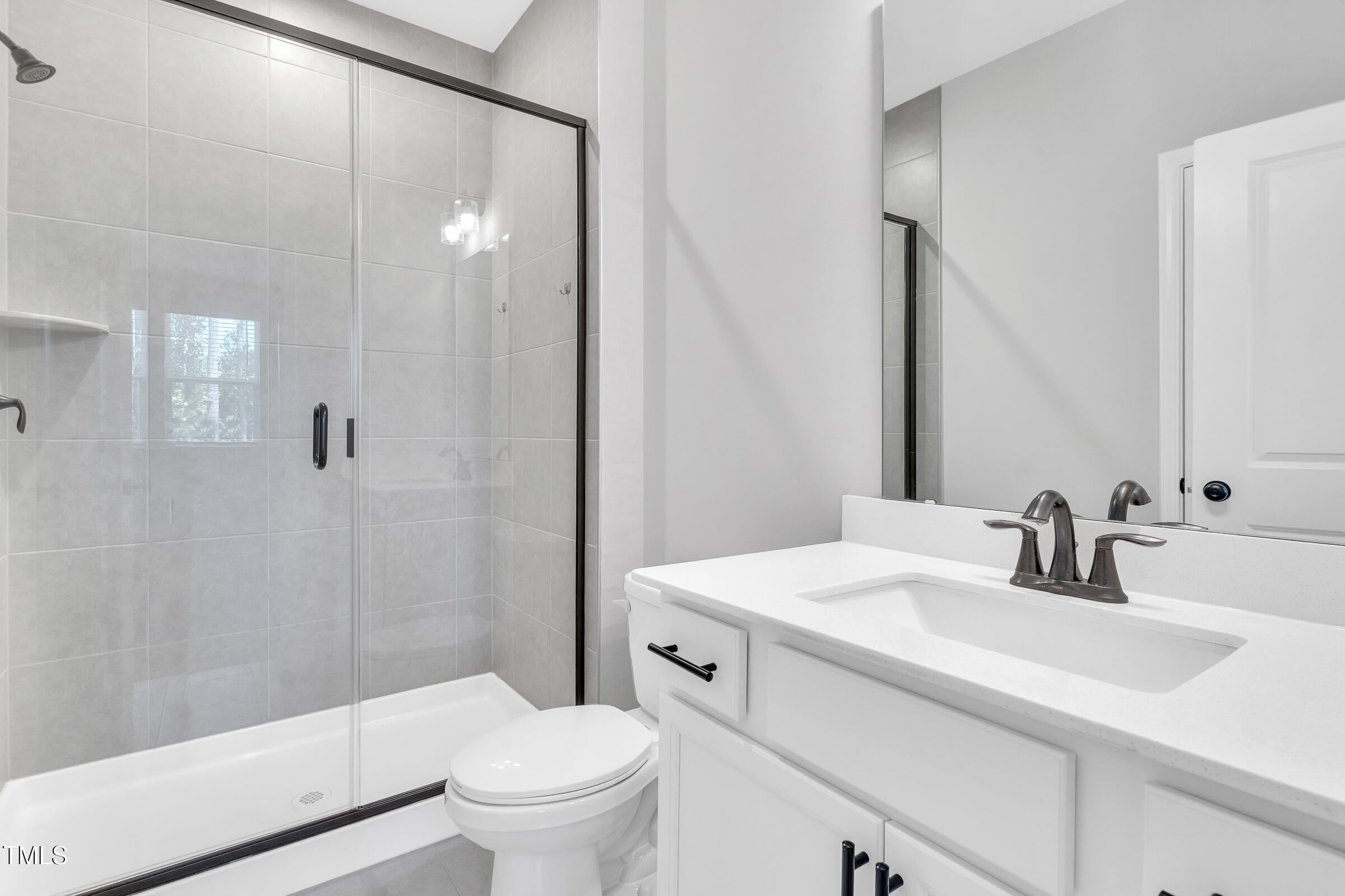 61 Cascade Place Clayton, NC 27527 - Photo 26 of 33 a bathroom with a sink toilet and shower