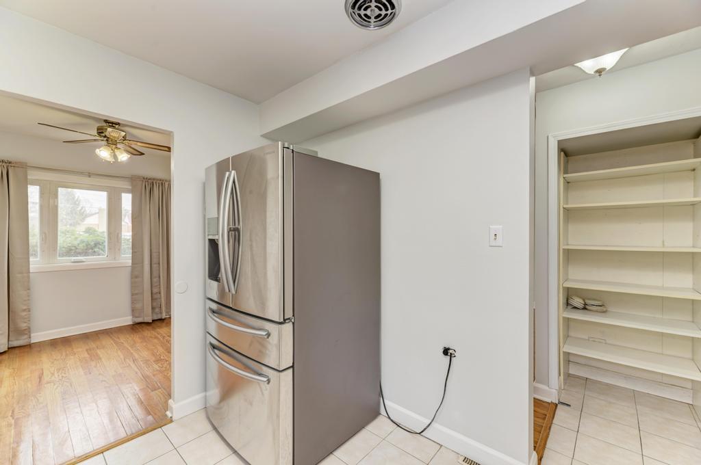 8625 43rd Street Lyons, IL 60534 - Photo 11 of 22 a view of kitchen with refrigerator and wooden floor