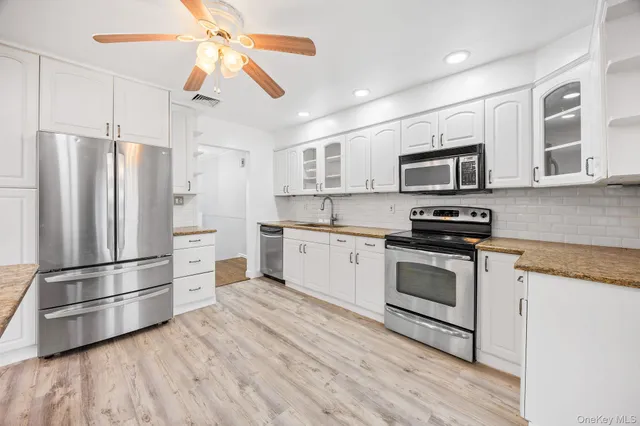 $999,000 | 14 Hilton Court, Hicksville, NY 11801