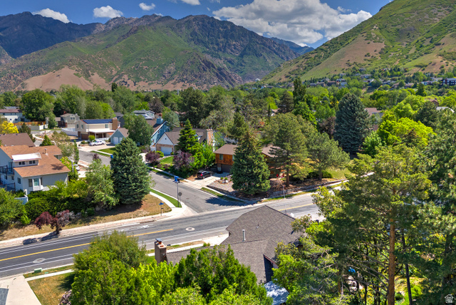 3310 Creek Road Salt Lake City, UT 84121 - Photo 47 of 49 Residential neighborhood featuring mature trees and mountain backdrops
