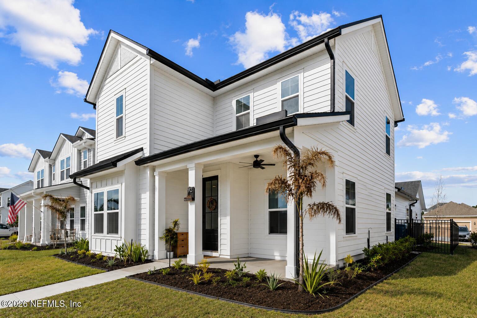 92 Patina Place St. Augustine, FL 32092 - Photo 2 of 26 a front view of a house with a yard