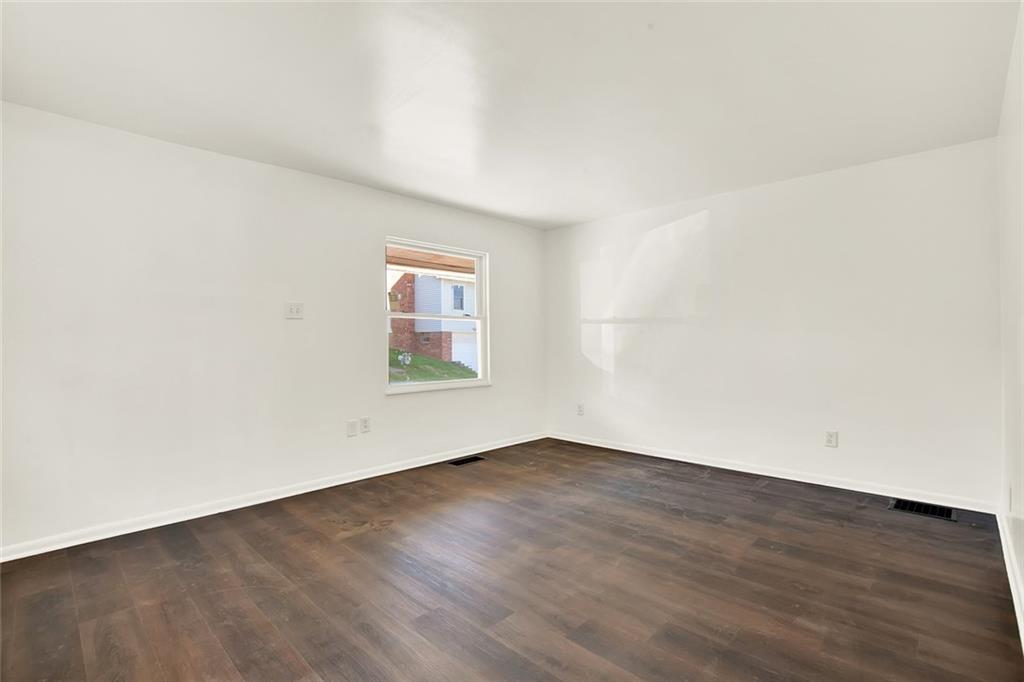 20 Oak Street Russellton, PA 15076 - Photo 20 of 31 an empty room with wooden floor and windows