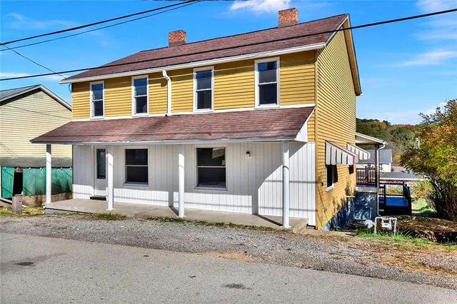 a view of house with street