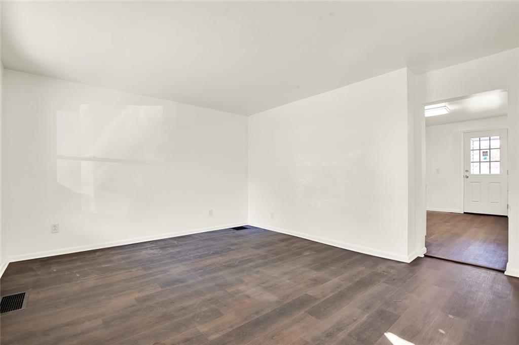 20 Oak Street Russellton, PA 15076 - Photo 21 of 31 an empty room with wooden floor and windows