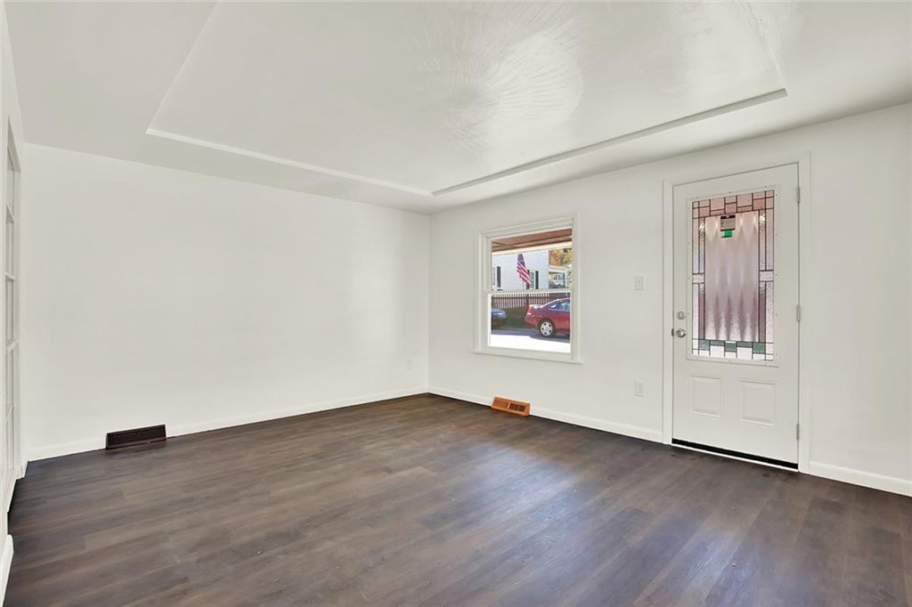 20 Oak Street Russellton, PA 15076 - Photo 30 of 31 an empty room with wooden floor and window