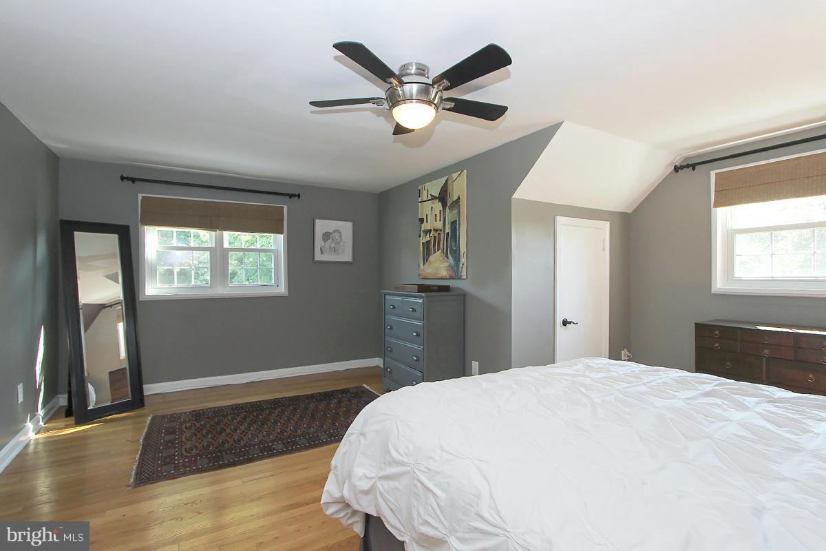 12701 Holdridge Road Silver Spring, MD 20906 - Photo 22 of 30 a bedroom with a bed and a window