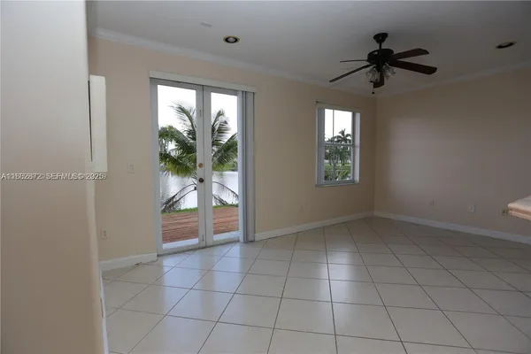 a view of an empty room and window