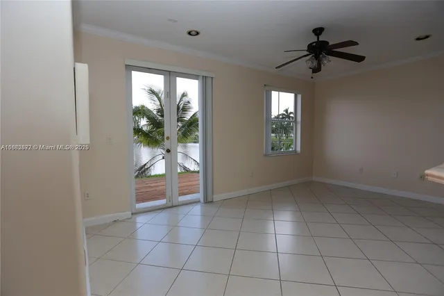 a view of an empty room and window