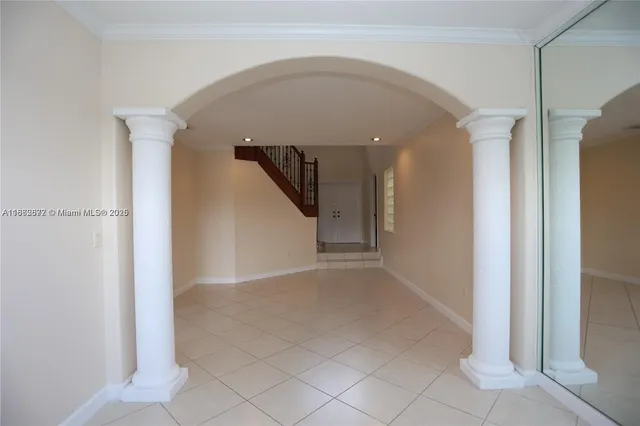 a view of a hallway with entryway