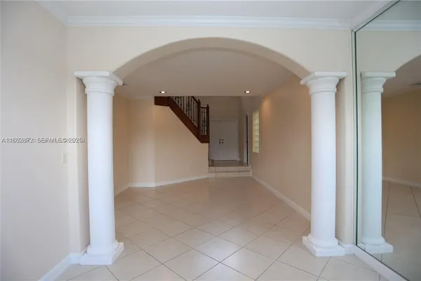 a view of a hallway with entryway