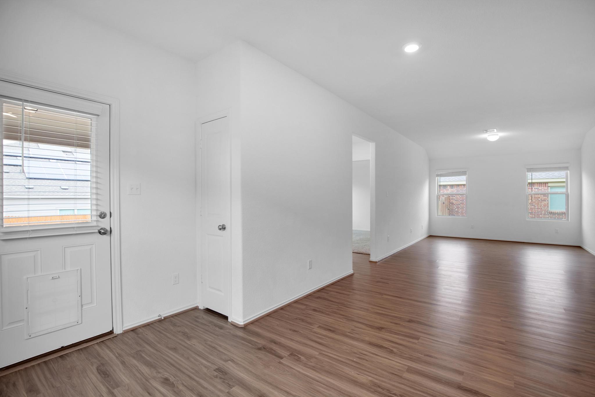 21409 Resource Road Pflugerville, TX 78660 - Photo 7 of 23 Foyer featuring wood finished floors and recessed lighting