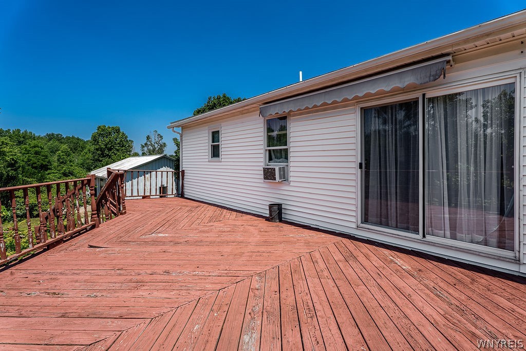 4015 Mapleton Road Wheatfield, NY 14120 - Photo 23 of 49 Second Story deck of Primary Bedroom