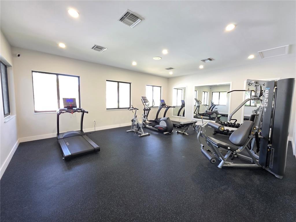 2640 South University Drive, Unit 129 Davie, FL 33328 - Photo 8 of 15 a view of a room with gym equipment