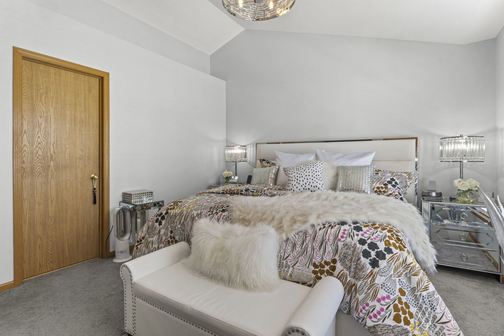 21617 Dogwood Road, Unit 1125 Matteson, IL 60443 - Photo 19 of 33 a bedroom with a bed and a lamp on the dresser