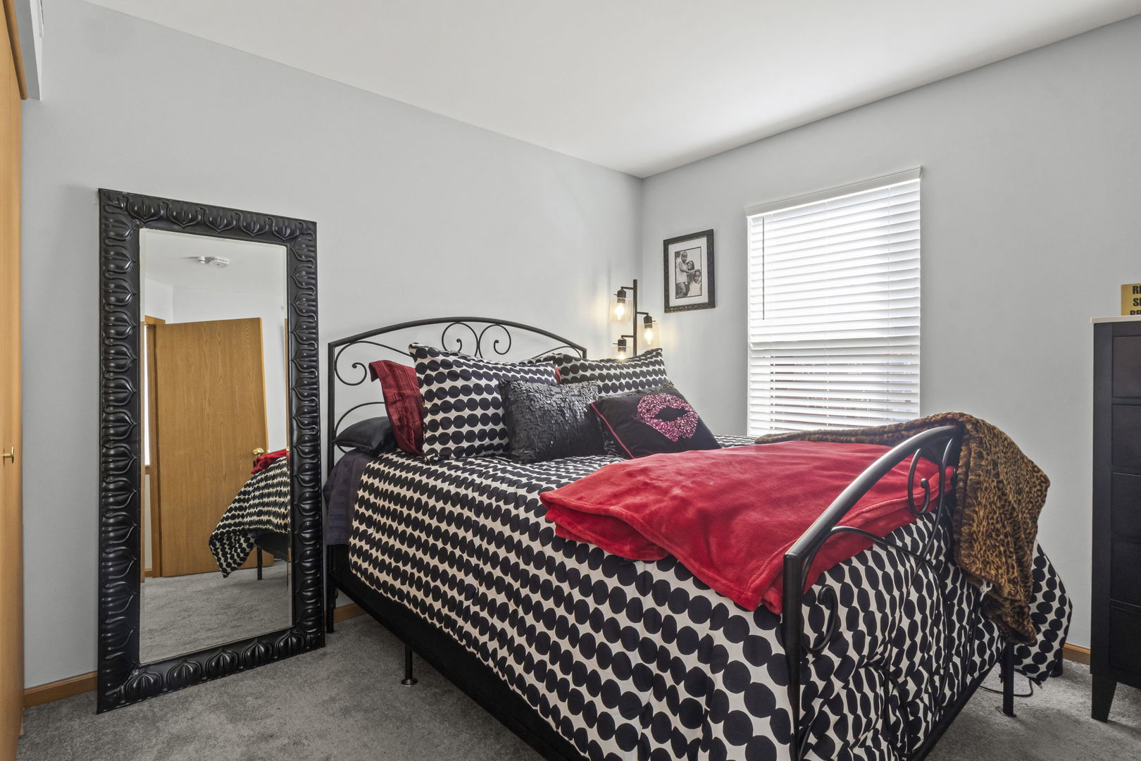 21617 Dogwood Road, Unit 1125 Matteson, IL 60443 - Photo 22 of 33 a bedroom with two beds and wooden floor