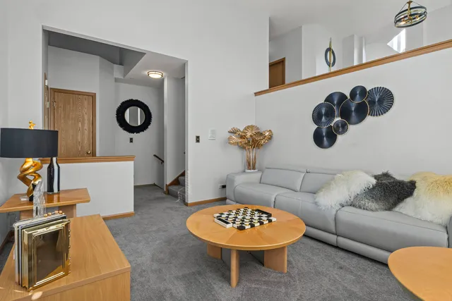 a living room with a couch and a table