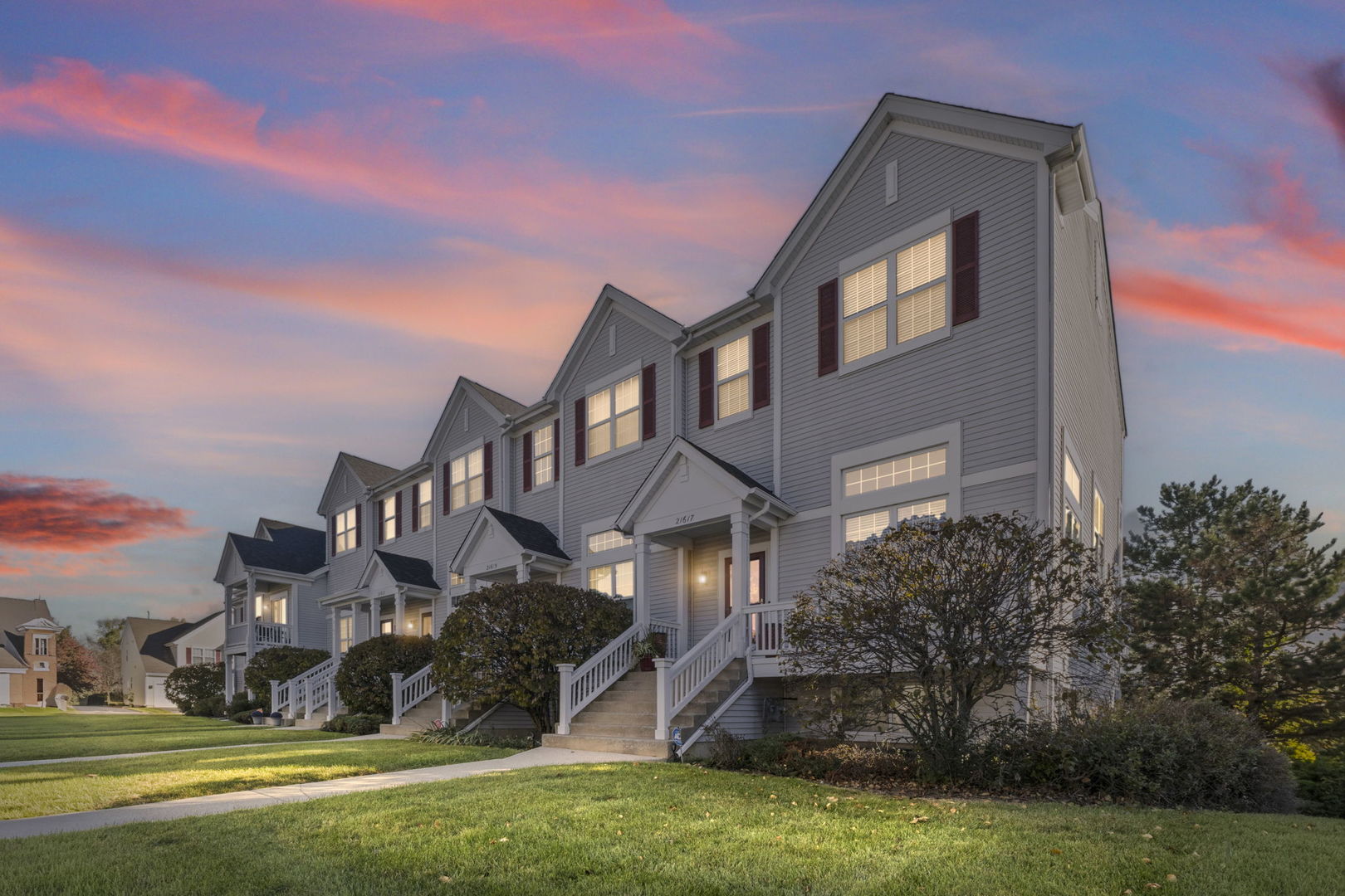 21617 Dogwood Road, Unit 1125 Matteson, IL 60443 - Photo 33 of 33 a front view of a house with a yard