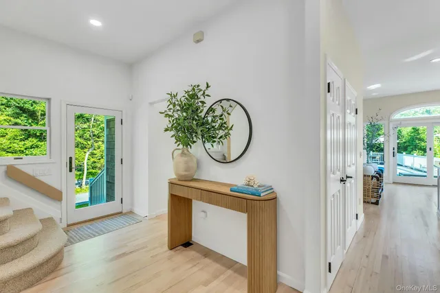 a view of entryway with wooden floor