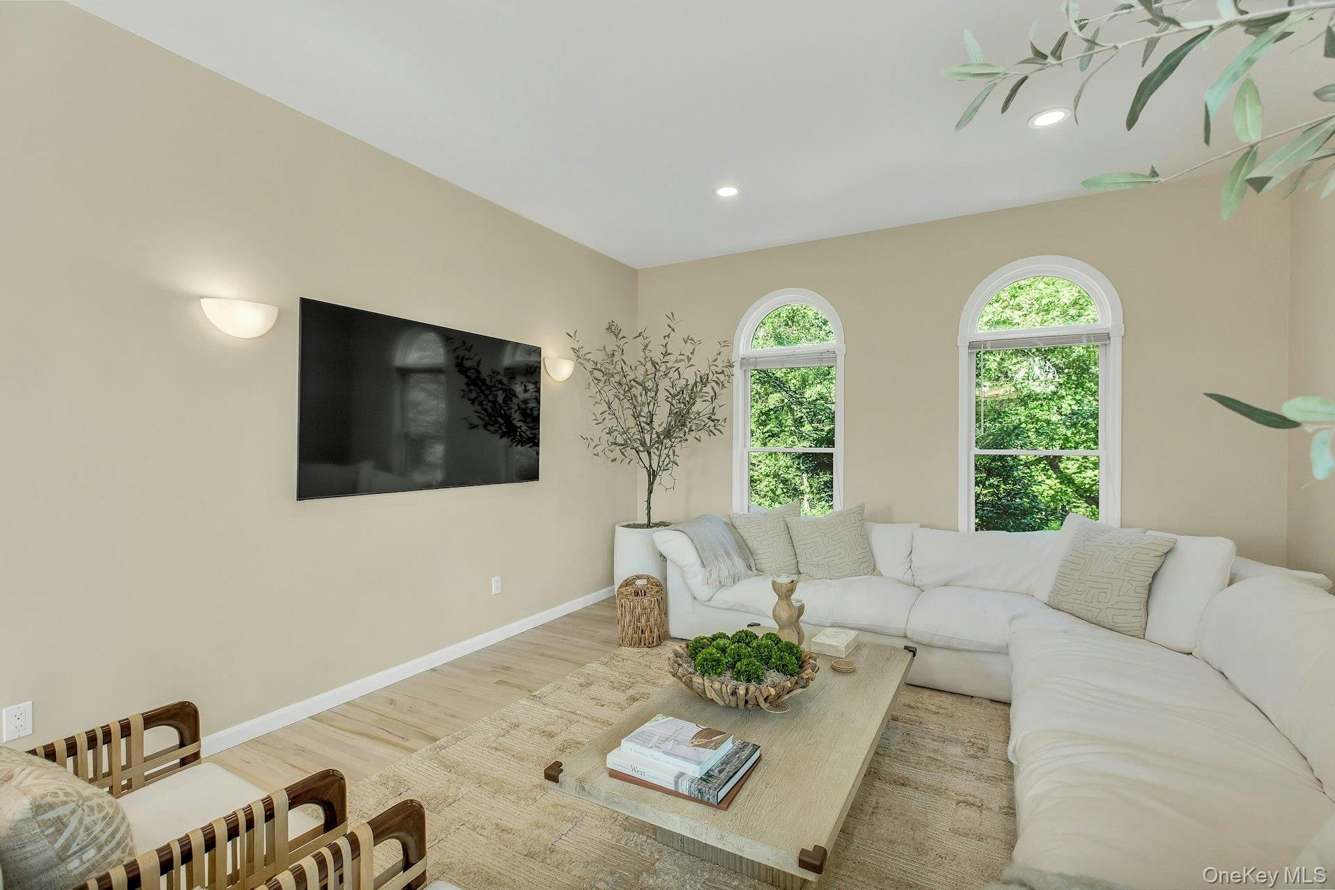56 South Country Road Westhampton, NY 11977 - Photo 10 of 43 a living room with furniture and a large window