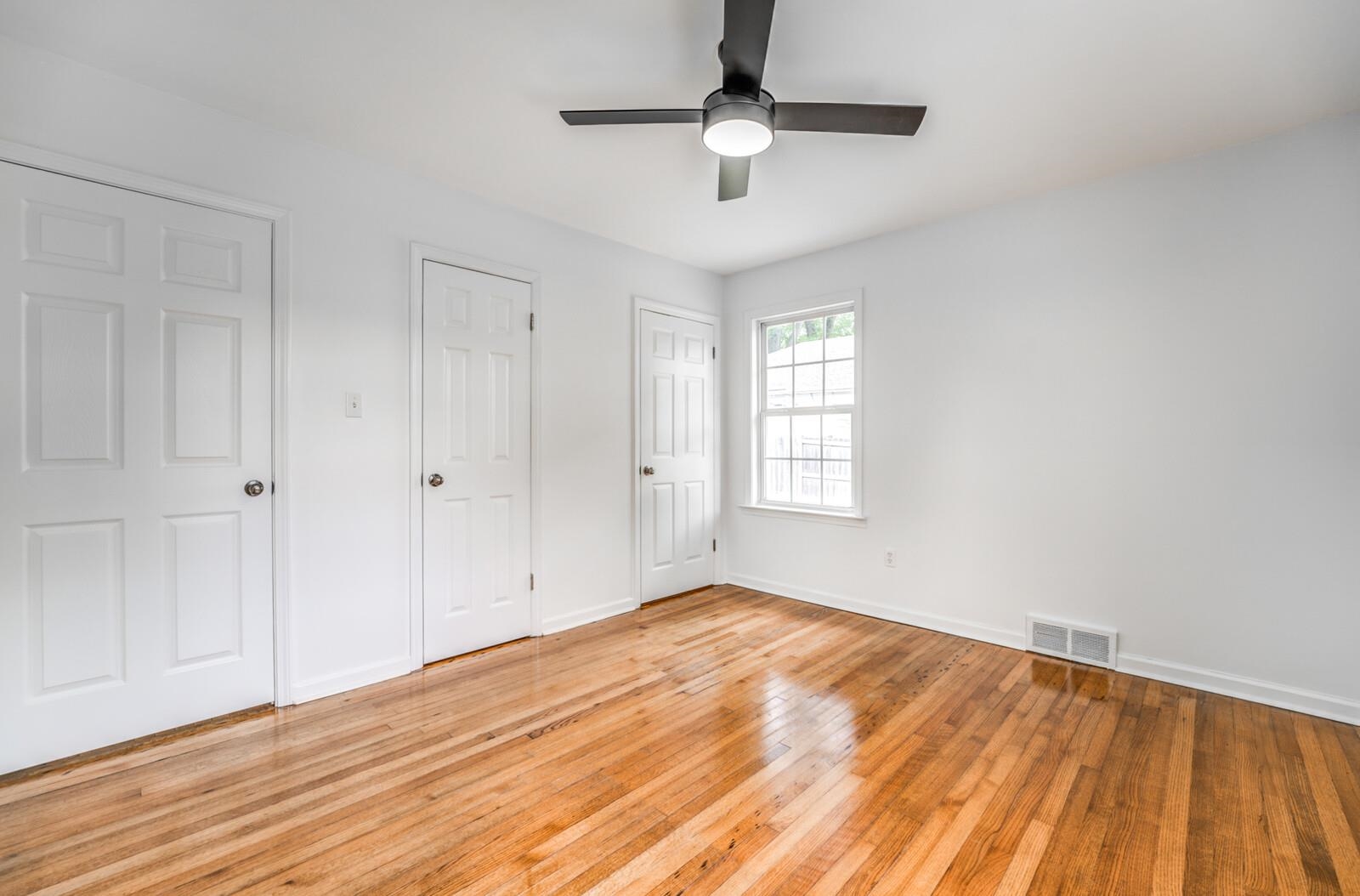 5600 Manley Road Memphis, TN 38120 - Photo 19 of 31 a view of empty room with wooden floor