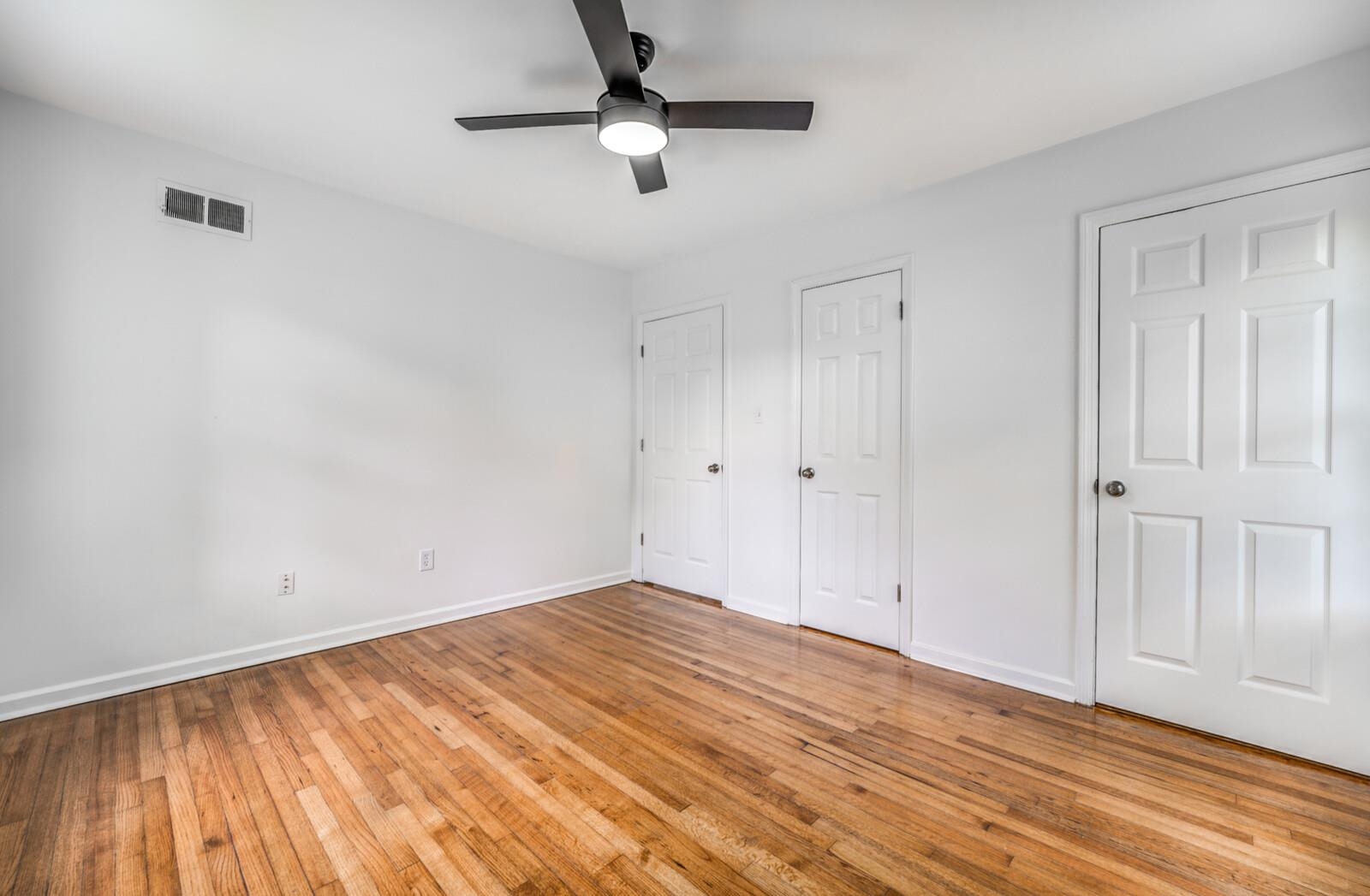 5600 Manley Road Memphis, TN 38120 - Photo 20 of 31 a view of empty room with wooden floor