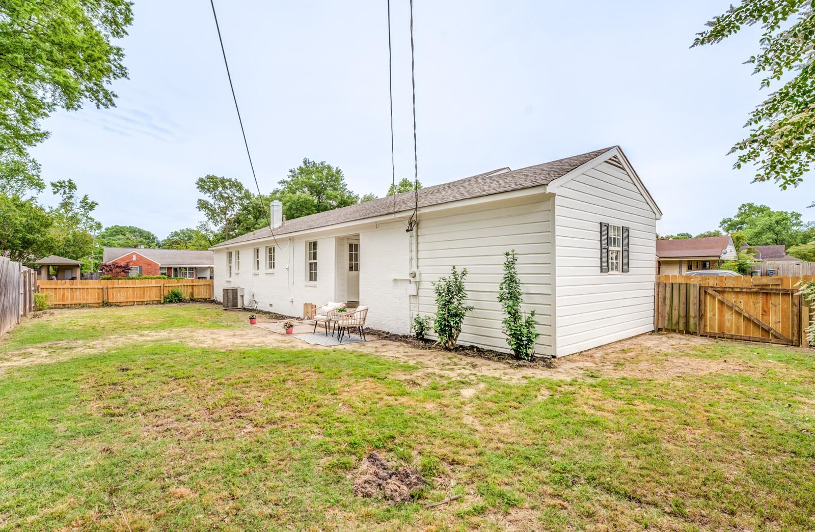 5600 Manley Road Memphis, TN 38120 - Photo 30 of 31 a view of a house with a yard