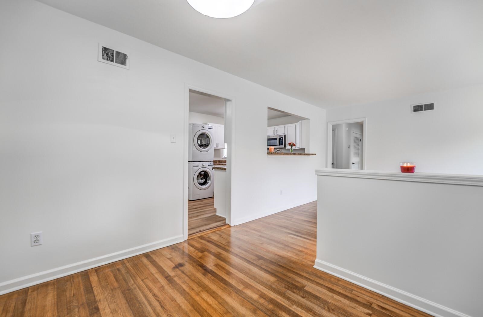 5600 Manley Road Memphis, TN 38120 - Photo 4 of 31 wooden floor in an empty room