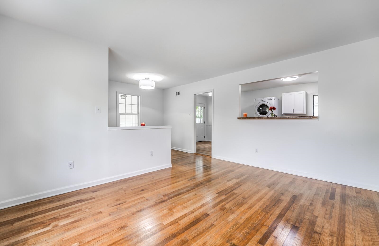 5600 Manley Road Memphis, TN 38120 - Photo 8 of 31 a view of a room with wooden floor and a window