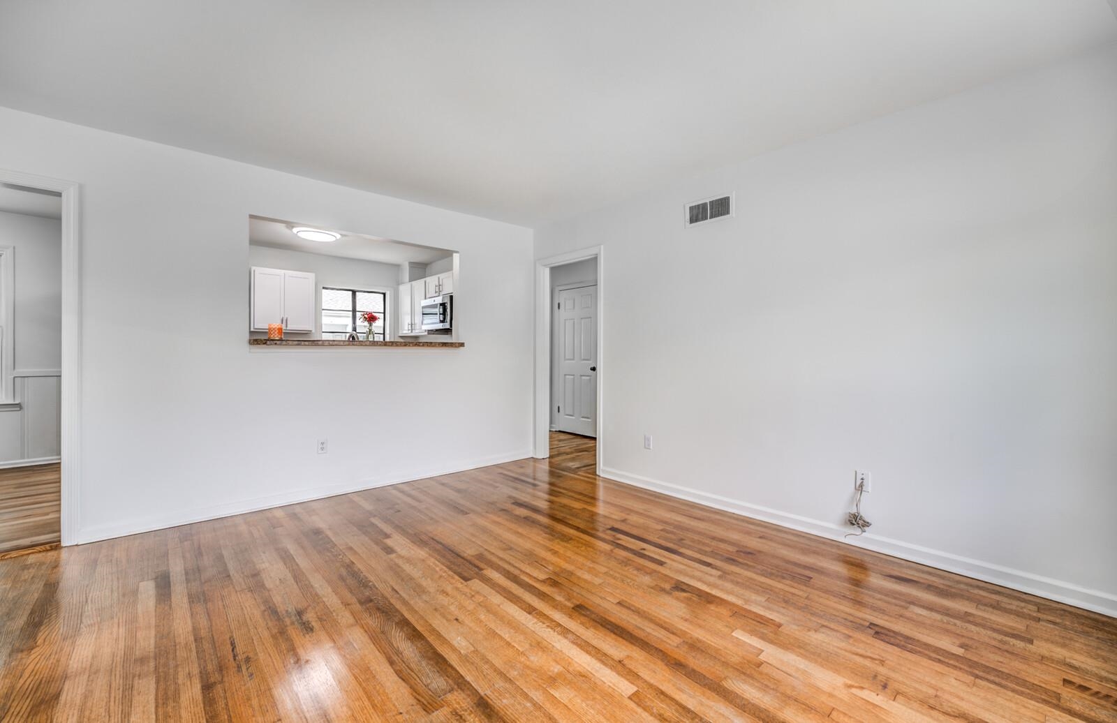 5600 Manley Road Memphis, TN 38120 - Photo 9 of 31 a view of empty room with wooden floor