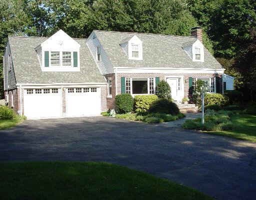 42 Soundview Road Ridgefield, CT 06877 - Photo 1 of 1 a view of front a house with a garden