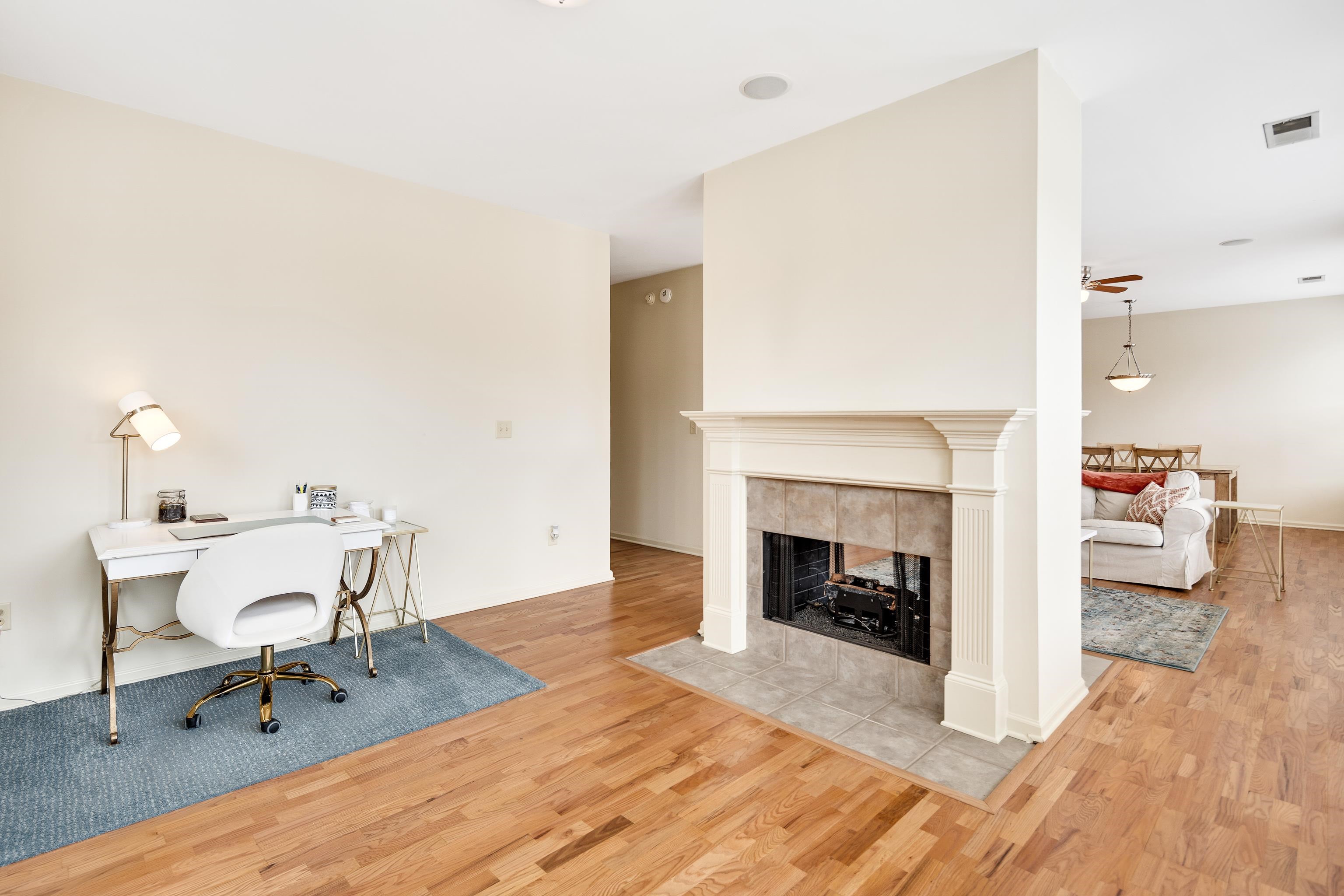 600 South Main Street, Unit 101 Memphis, TN 38103 - Photo 17 of 35 a living room with furniture and a fireplace