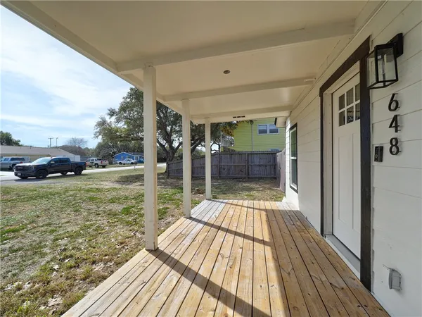 a view of backyard with green space