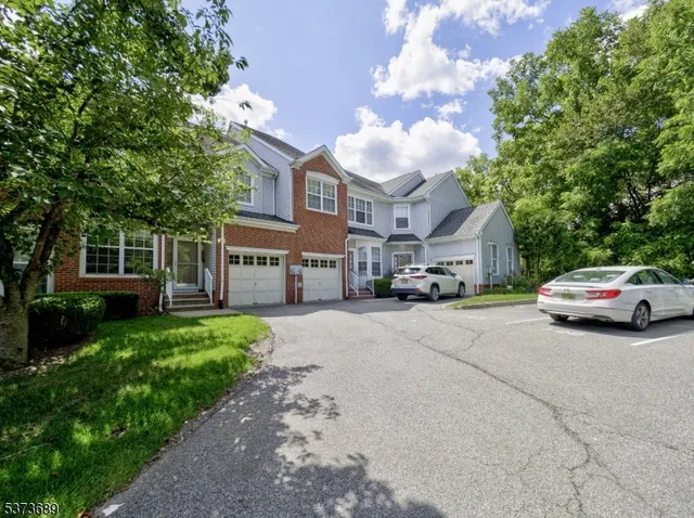 a view of a car in front of house