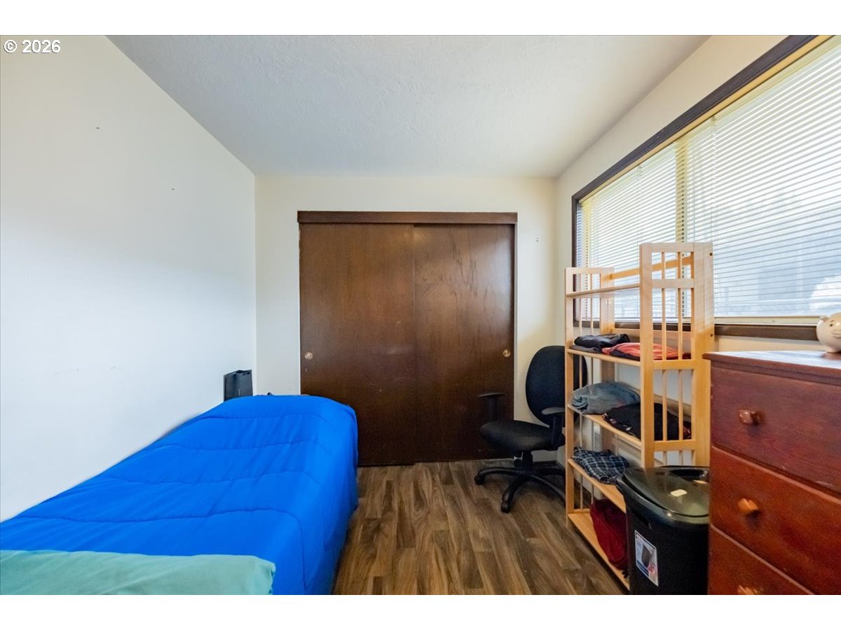 1360 Sunset Lane Sweet Home, OR 97386 - Photo 16 of 26 a view of workspace with wooden floor