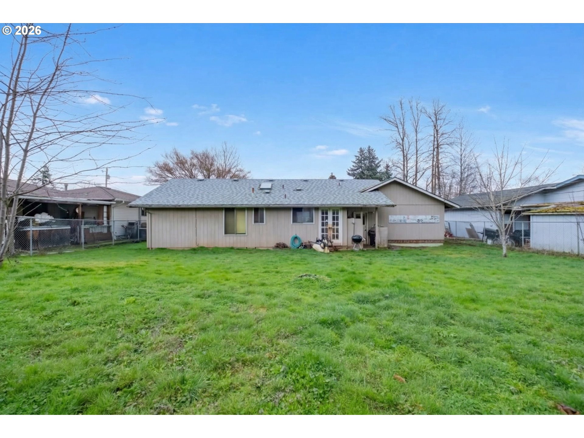 1360 Sunset Lane Sweet Home, OR 97386 - Photo 21 of 26 a view of a house with a big yard and large tree