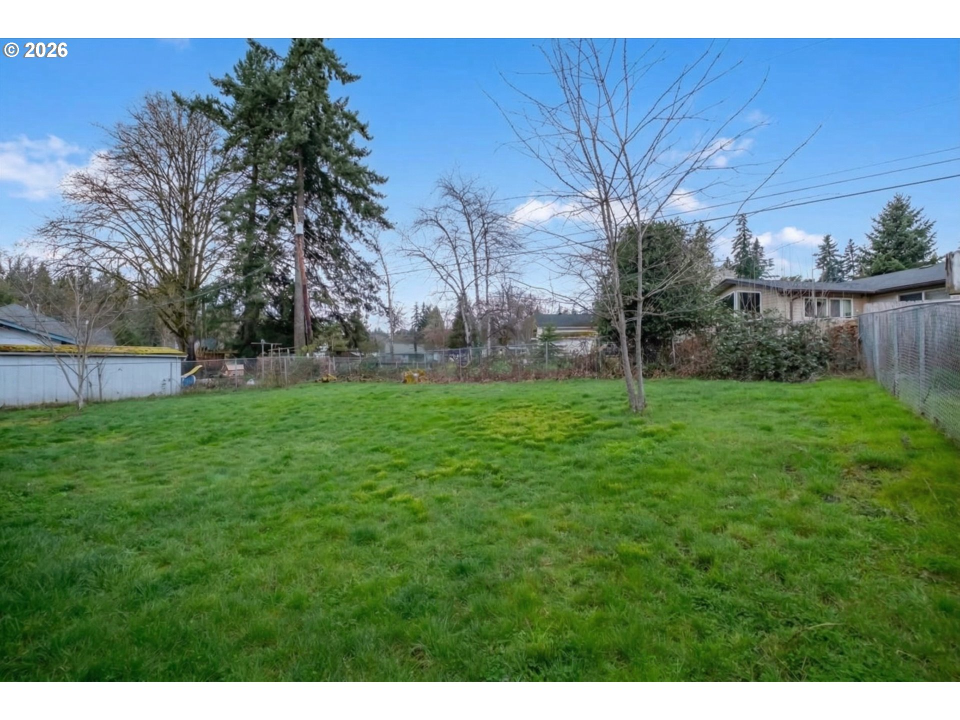 1360 Sunset Lane Sweet Home, OR 97386 - Photo 22 of 26 a view of a yard with an tree