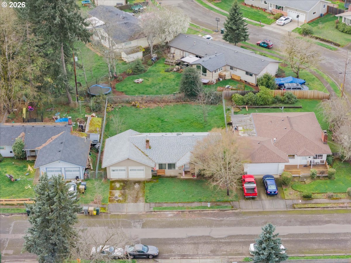 1360 Sunset Lane Sweet Home, OR 97386 - Photo 24 of 26 an aerial view of a house with a garden and pathway