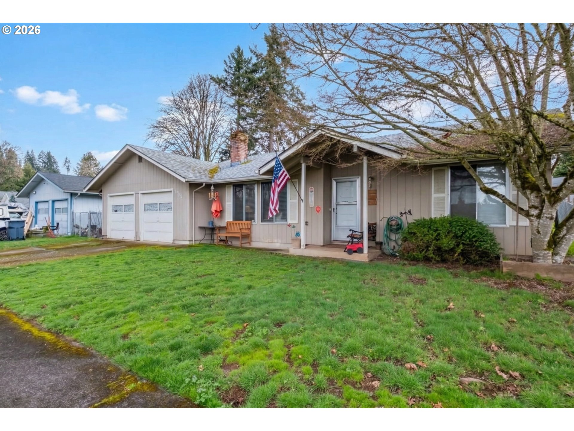 1360 Sunset Lane Sweet Home, OR 97386 - Photo 26 of 26 a view of a house with backyard and a tree