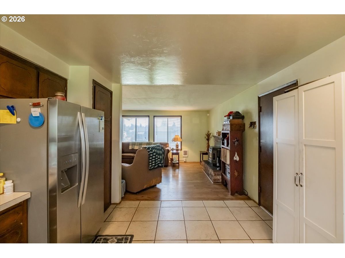 1360 Sunset Lane Sweet Home, OR 97386 - Photo 7 of 26 a open kitchen with refrigerator stove and refrigerator