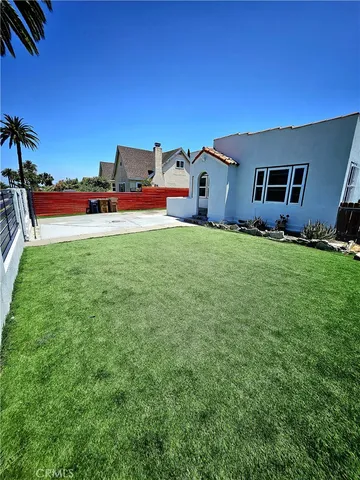 a house view with a garden space