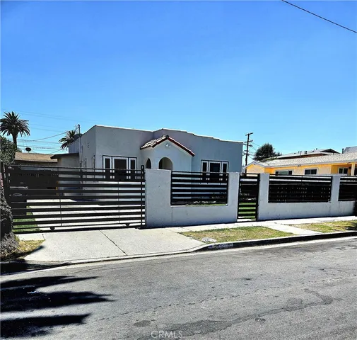 a view of a house with a street