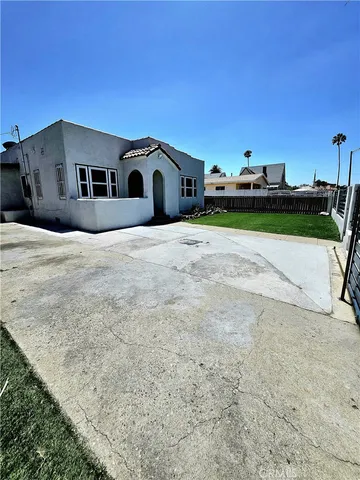 a house view with a garden space