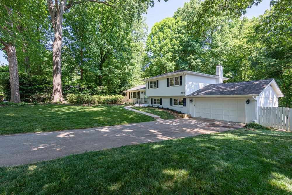 509 Compton Road Raleigh, NC 27609 - Photo 2 of 30 Split level with 2 car garage with 2 workshops in back of garage. Exterior Front