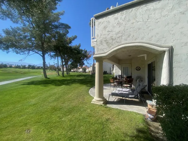 a view of a building with garden