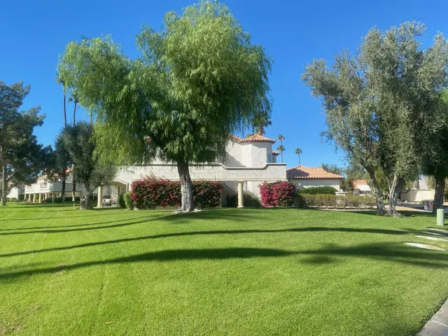 a front view of a white and a white house