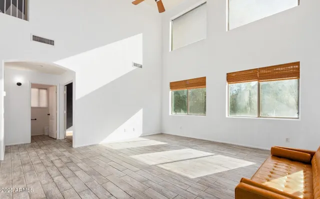 a view of an empty room and window