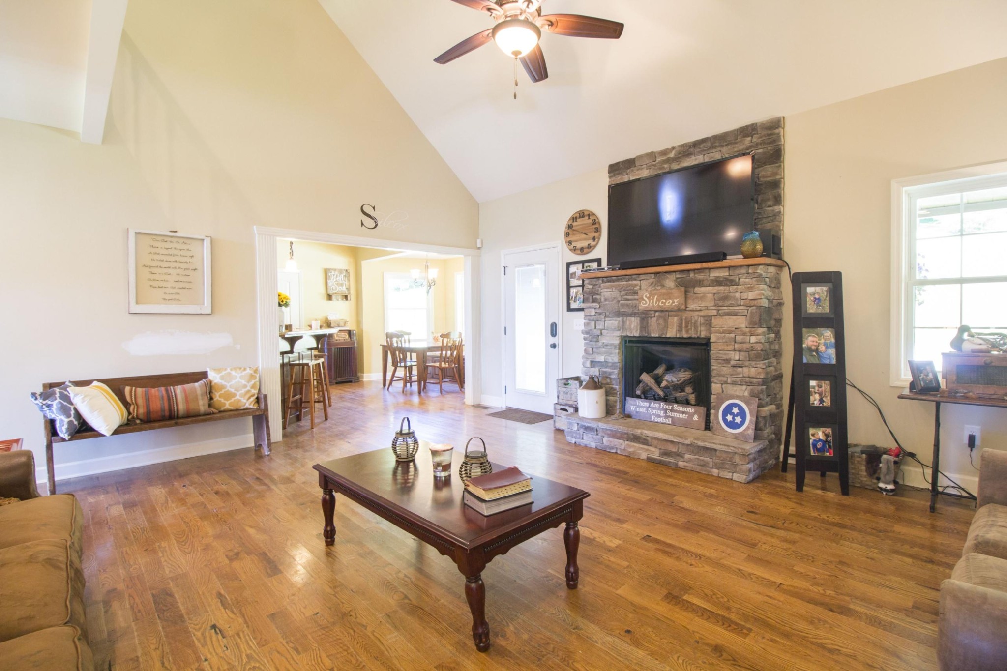 57 Lakeside Drive Carthage, TN 37030 - Photo 15 of 34 a living room with furniture a flat screen tv and a fireplace
